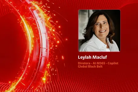 Imagem bordô e vermelha com um círculo vermelho, com faíscas amarelas e, ao lado a imagem de um mulher branca, com olhos e cabelos castanhos, usando uma camisa branca, acompanhado do texto "Leylah Macluf  Diretora - AI M365 - Copilot Global Black Belt"